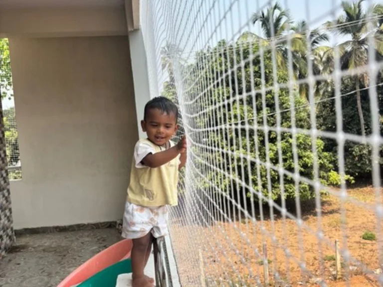 Professional children safety net installation for balconies, terraces, and windows to prevent accidents and ensure child safety.