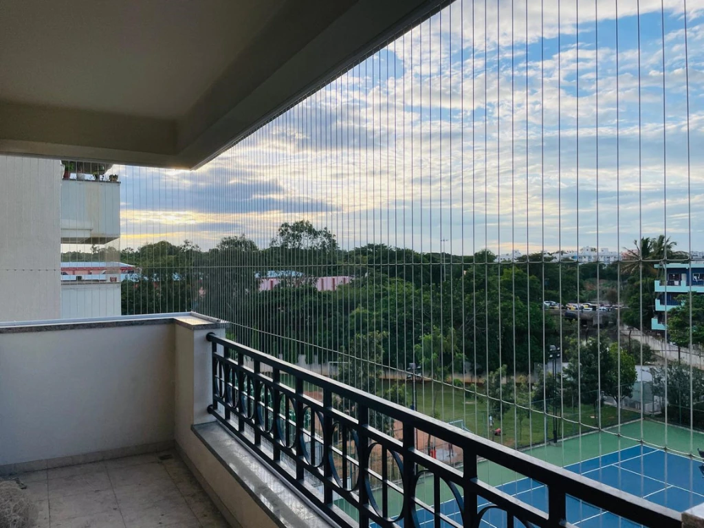 Durable invisible grills installed on homes and apartments to protect children and pets while maintaining a modern aesthetic.